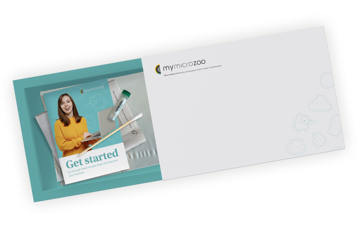 Testkit box showing a swab, tube and instructions